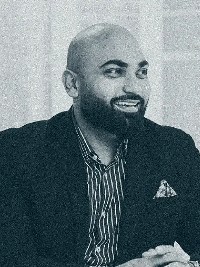 team taj hussain@2x 1